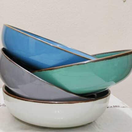 Add a rustic touch to your dinner table. Crafted from durable and chip-resistant ceramic with a glossy finish. Comes in four earthy colors.