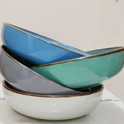 Add a rustic touch to your dinner table. Crafted from durable and chip-resistant ceramic with a glossy finish. Comes in four earthy colors.
